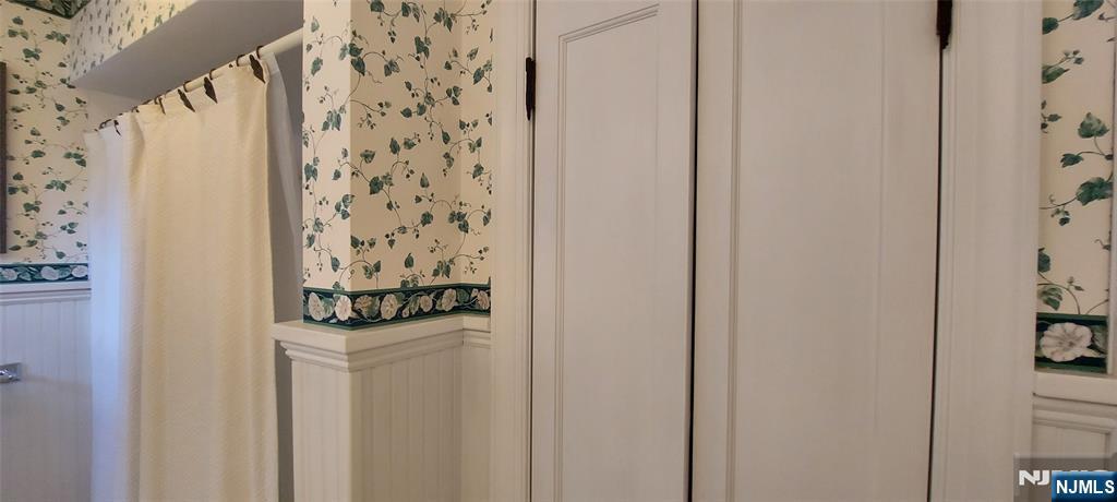 Shower & Tub with Linen Closet in Full Bath