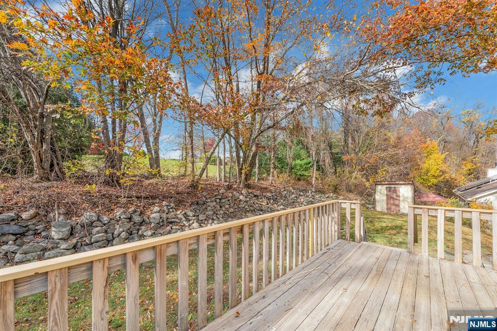2nd floor deck leads to level upper yard