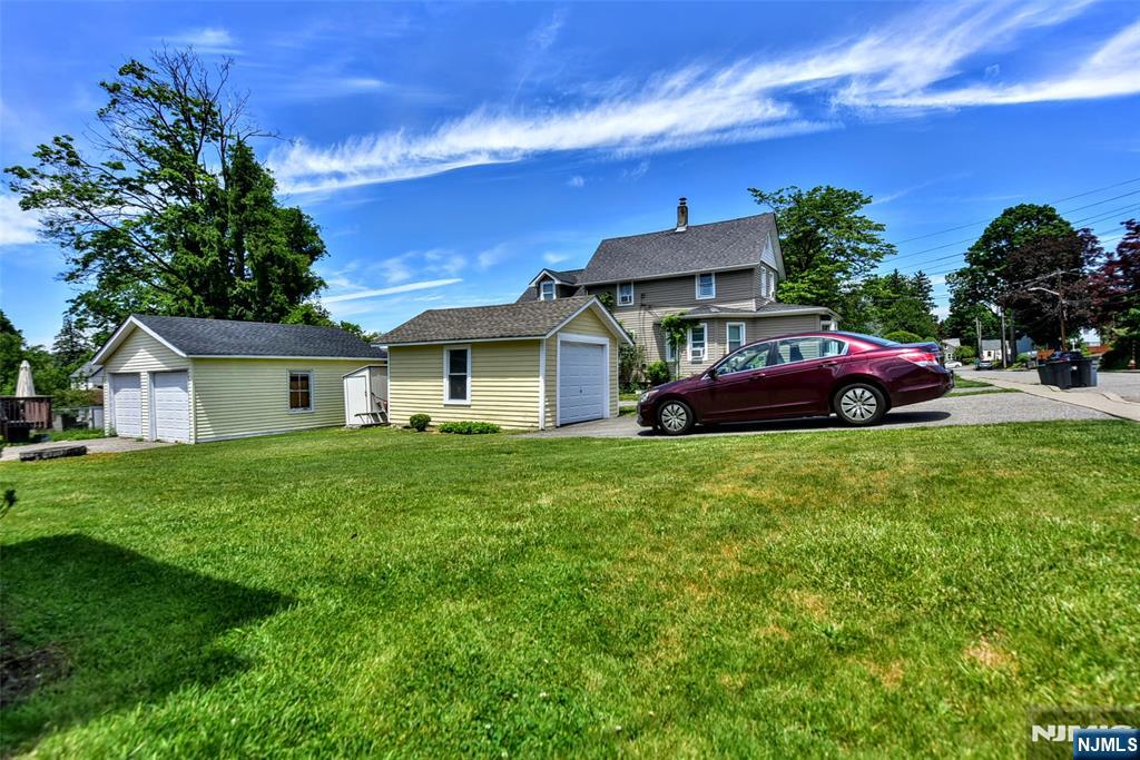 Backyard, Garage & Driveway.