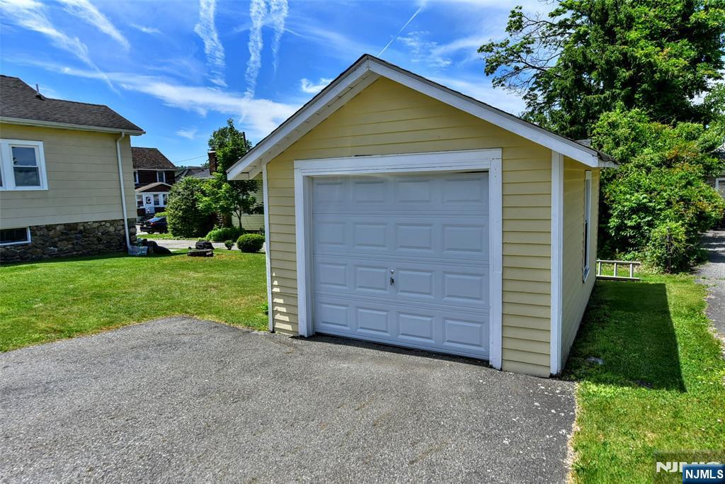 Garage with Driveway.