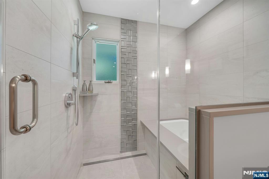deep soaker tub inside the shower