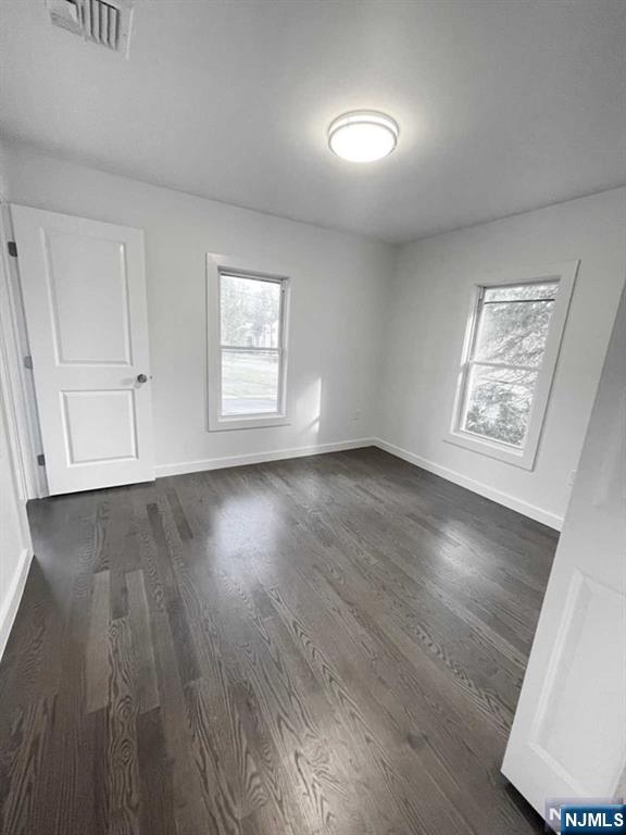 Primary Bedroom with Hardwood Floors