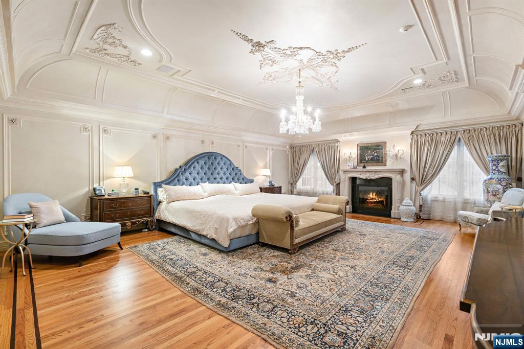 Indulgent Primary Suite with Lounge, balcony overlooking the Pool, Spa-Like Bath
