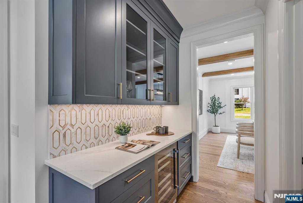 Butler's Pantry with Wine Fridge Opens to Dining Room