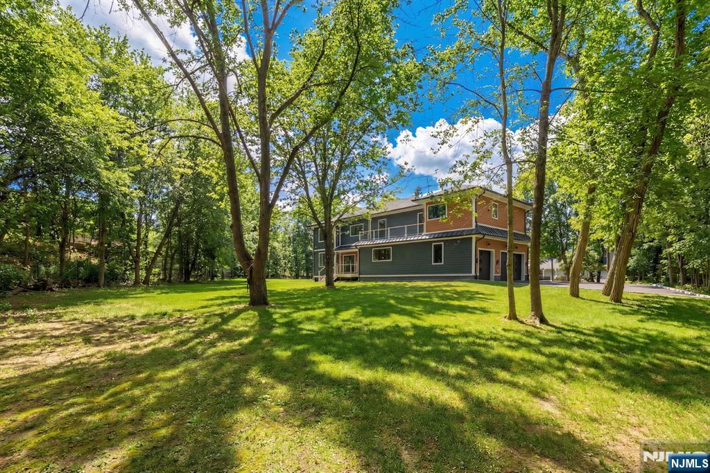 A rare opportunity to own a newly constructed home that effortlessly combines luxury, scale, and modern convenience