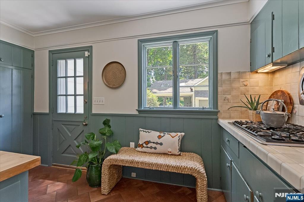 Kitchen opens to backyard & patio