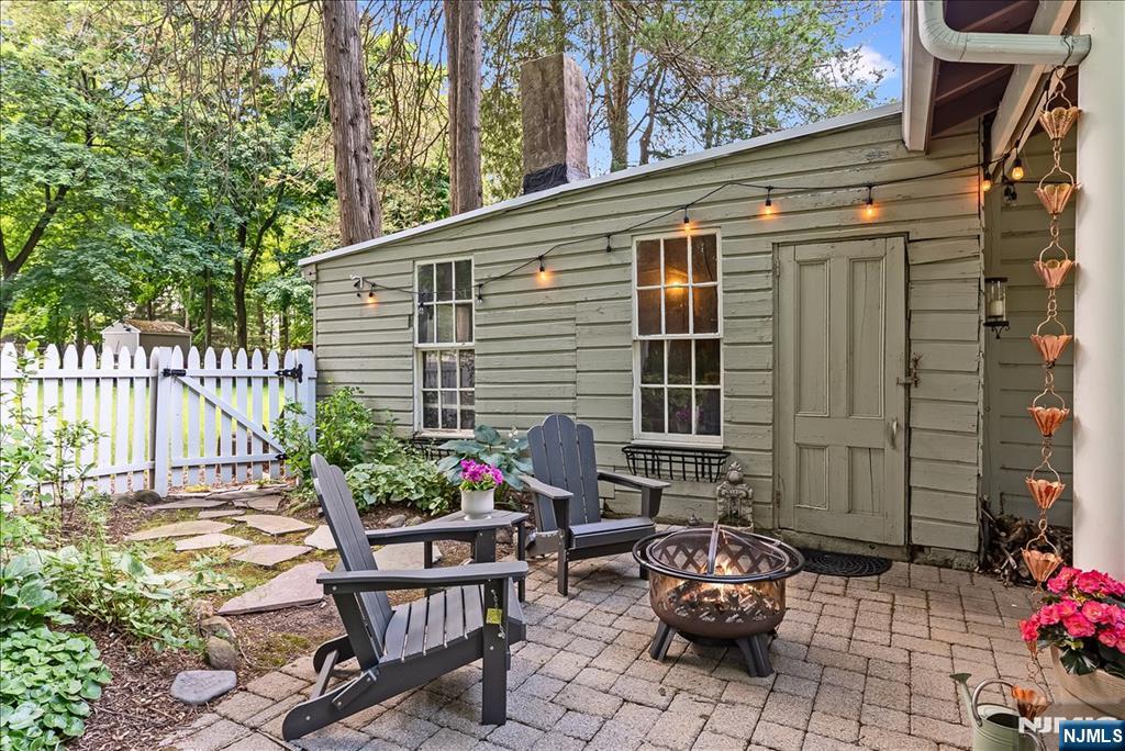 Enormous attached storage at back of garage