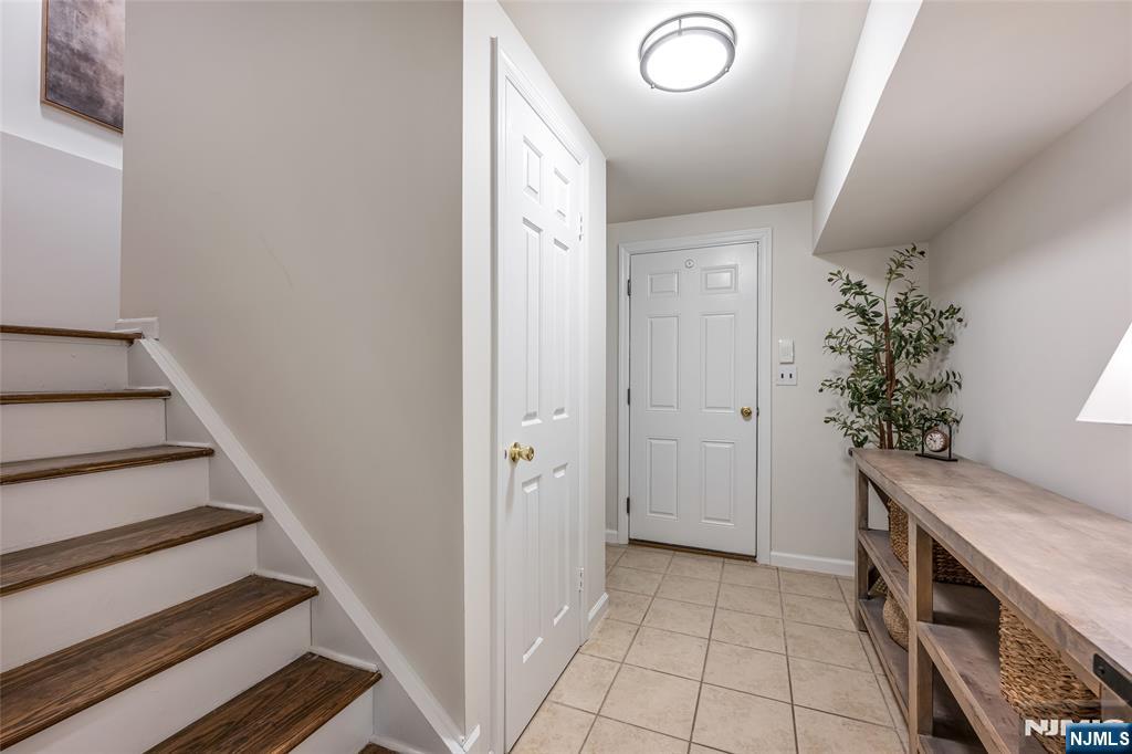 Steps to Full Finished Basement and Garage