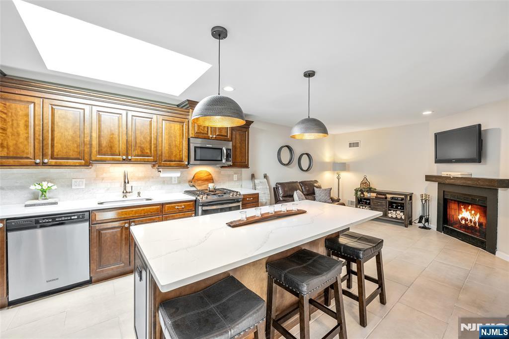 Large Quartz Island and Radiant Heat Flooring