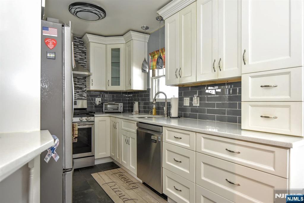 Photo 2 of Single family home for sale at 166 Kent St, Hackensack, NJ 07601 | MLS# 26023403 | Listing updated on 2026-09-18