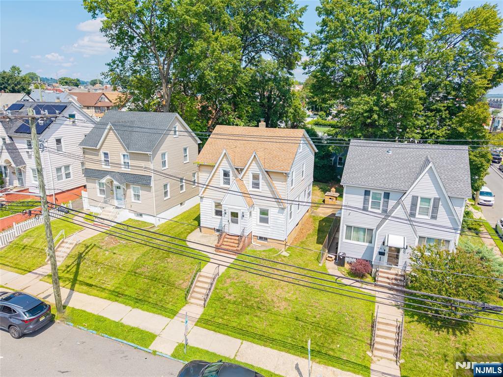 Photo 2 of Single family home for sale at 239 8th Avenue, Paterson, NJ 07514 | MLS# 26029733 | Listing updated on 2026-09-18