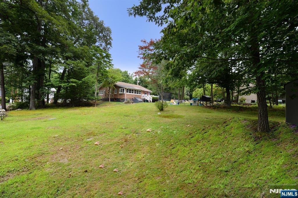Photo 34 of Single family home for sale at 100 Tower Rd, Wayne, NJ 07470 | MLS# 26033603 | Listing updated on 2026-09-04