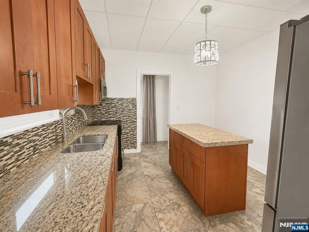 Photo 4 of Multi family home for sale at 85 N 11th Street, Paterson, NJ 07522 | MLS# 26033622 | Listing updated on 2026-09-17