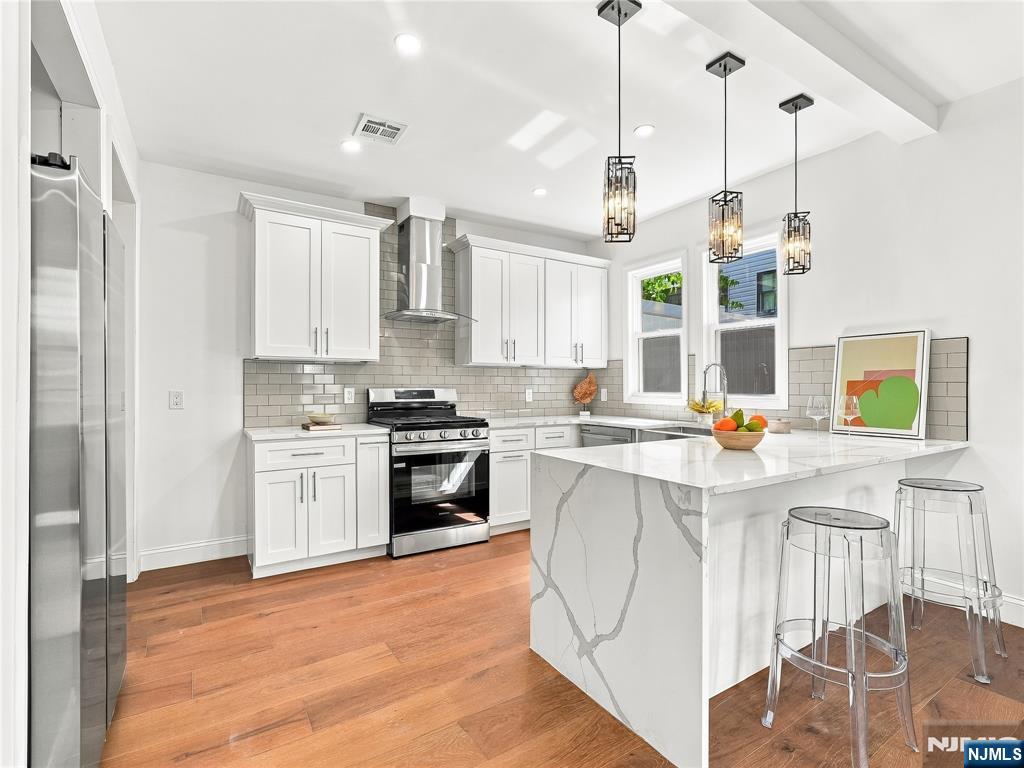 Photo 3 of Single family home for sale at 42 Passaic Ave, Jersey City, NJ 07307 | MLS# 26033819 | Listing updated on 2026-09-16