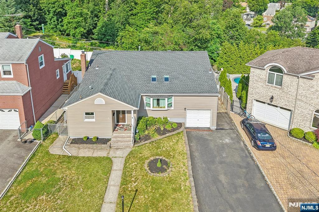 Photo 2 of Single family home for sale at 84 Howard Pl, Nutley, NJ 07110 | MLS# 26033843 | Listing updated on 2026-10-06