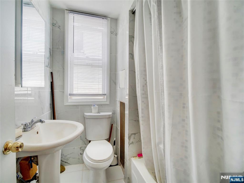 Photo 4 of Single family home for sale at 139-141 Richelieu Ter, Newark, NJ 07106 | MLS# 26034022 | Listing updated on 2026-09-14