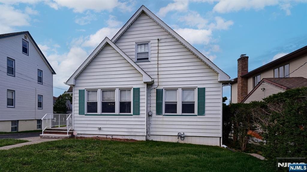 Photo 2 of Single family home for sale at 21 Main St, Garfield, NJ 07026 | MLS# 26034209 | Listing updated on 2026-09-18