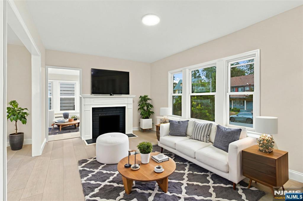 Photo 2 of Single family home for sale at 58 Wayne Ave, East Orange, NJ 07018 | MLS# 26034237 | Listing updated on 2026-09-13