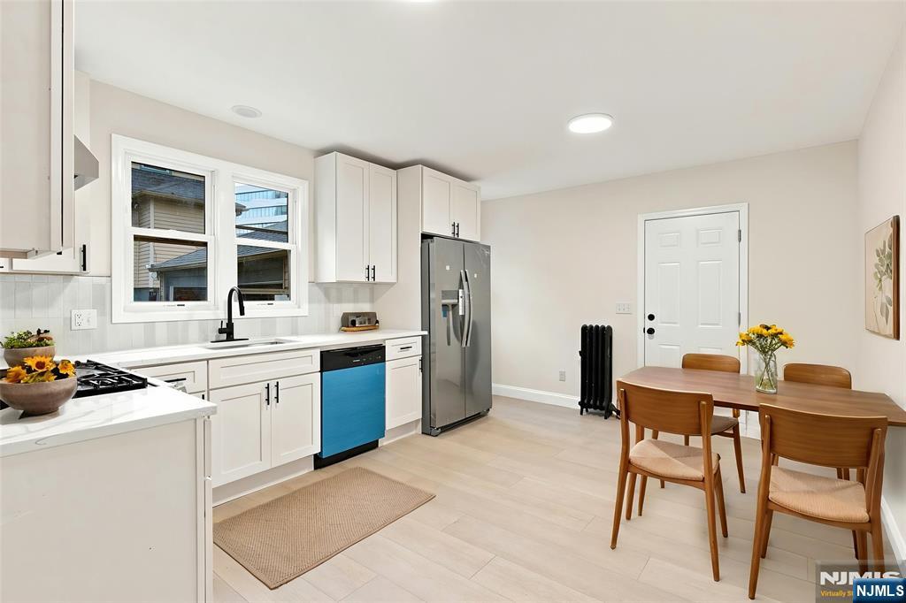 Photo 4 of Single family home for sale at 58 Wayne Ave, East Orange, NJ 07018 | MLS# 26034237 | Listing updated on 2026-09-13
