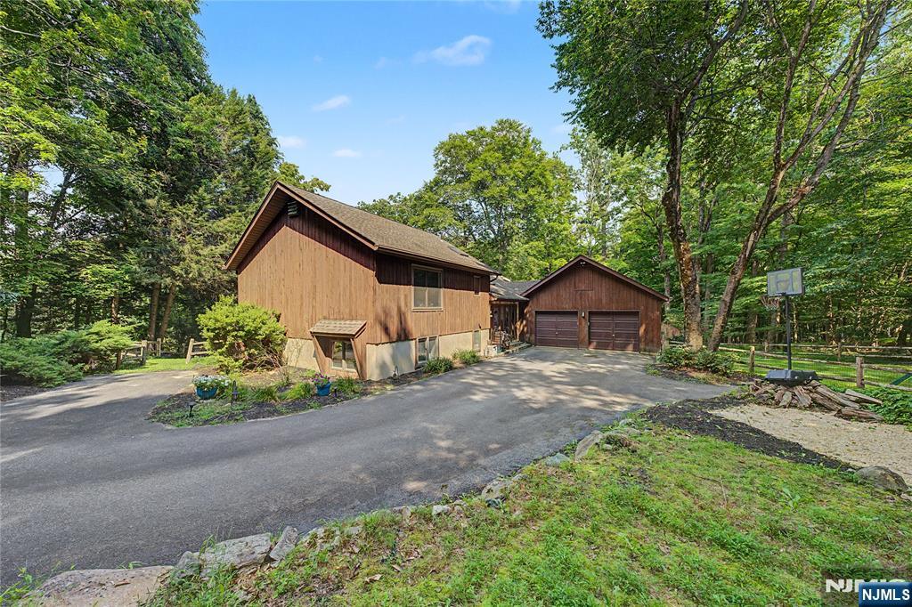 Photo 2 of Single family home for sale at 451 W Brook Rd, Ringwood, NJ 07456 | MLS# 26034387 | Listing updated on 2026-09-13