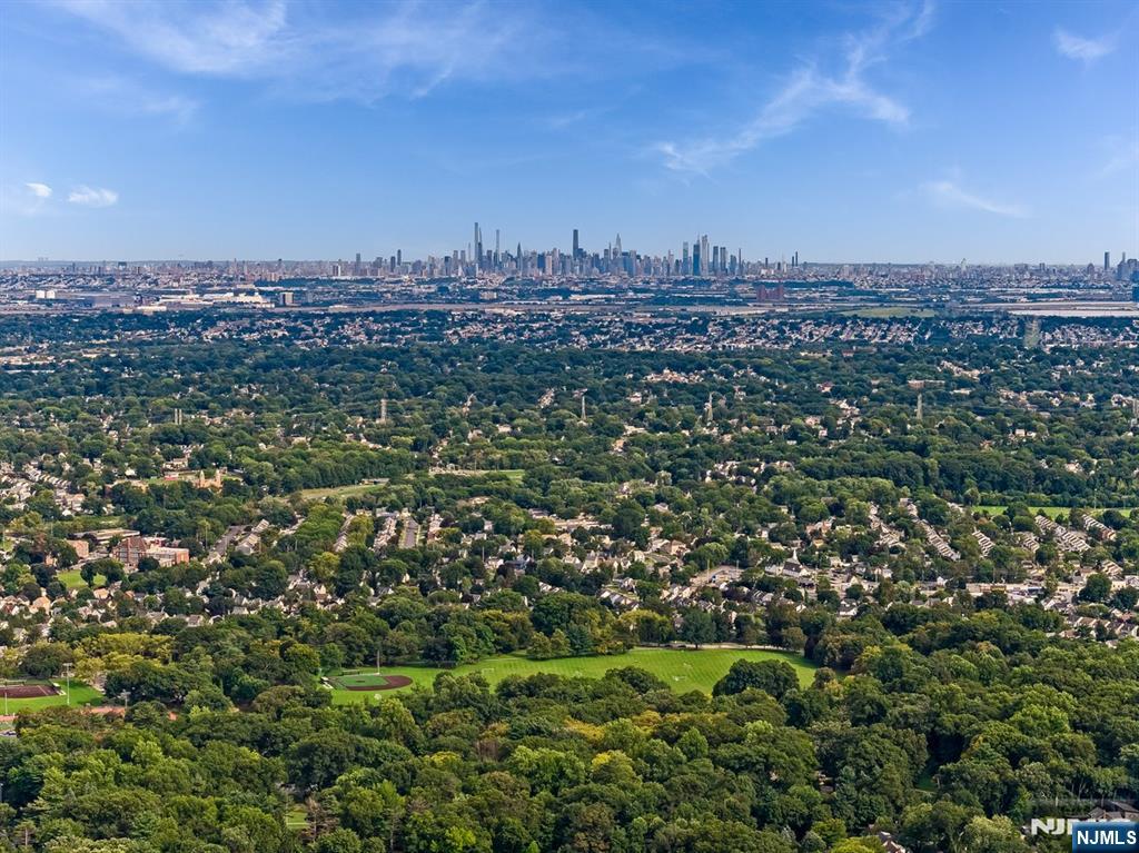 Photo 3 of Single family home for sale at 106 Wildwood Ave, Montclair, NJ 07043 | MLS# 26034445 | Listing updated on 2026-09-20