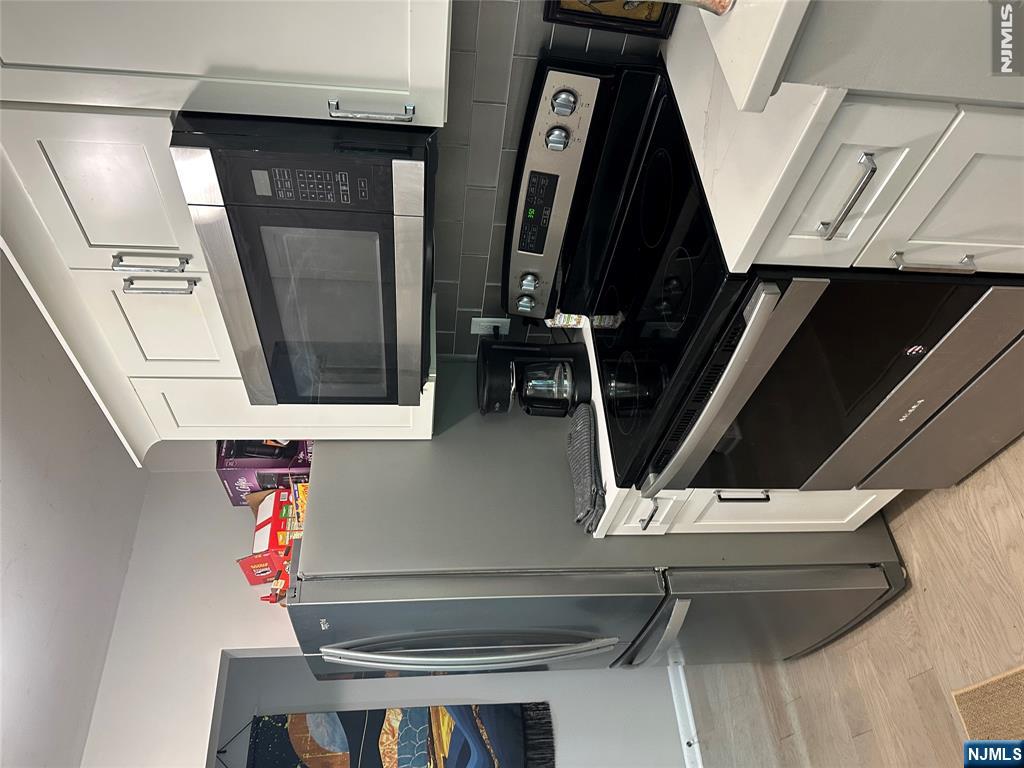 Photo 2 of Condo for sale at 100 Pierson Miller #F12, Pompton Lakes, NJ 07442 | MLS# 26034542 | Listing updated on 2026-09-11