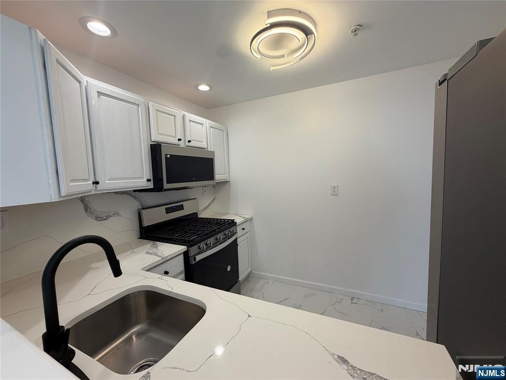 Listing Photo 5 - Condo for sale in building located at 131 Clinton Pl, Hackensack, NJ 07601 - Unit #214