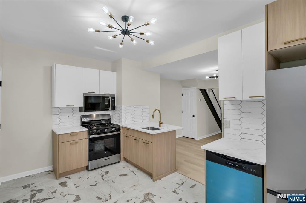 Photo 2 of Multi family home for sale at 263 Sanford St, East Orange, NJ 07018 | MLS# 26035103 | Listing updated on 2026-09-16