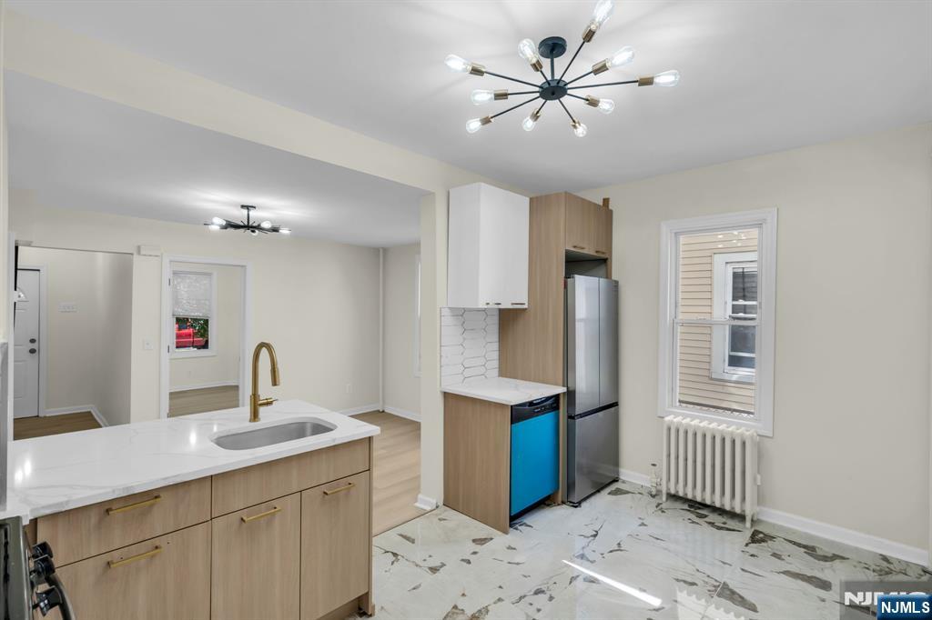 Photo 3 of Multi family home for sale at 263 Sanford St, East Orange, NJ 07018 | MLS# 26035103 | Listing updated on 2026-09-16