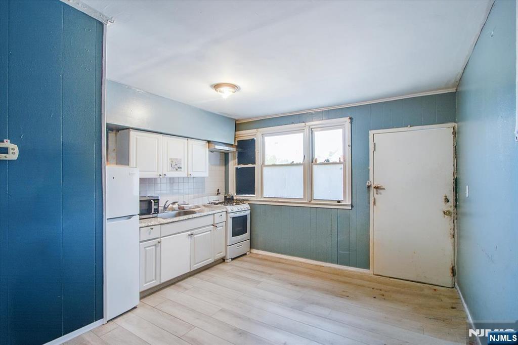 Photo 4 of Multi family home for sale at 37 Newark Pompton Turnpike, Little Falls, NJ 07424 | MLS# 26035224 | Listing updated on 2026-09-17