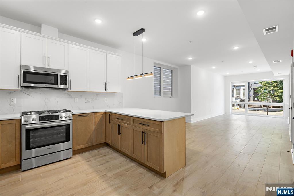 Photo 2 of Condo for sale at 1001 Summit Ave #1, Jersey City, NJ 07307 | MLS# 26035423 | Listing updated on 2026-09-17