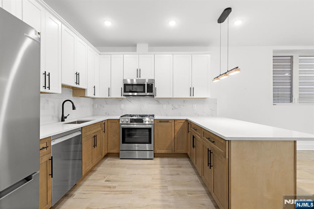Photo 4 of Condo for sale at 1001 Summit Ave #1, Jersey City, NJ 07307 | MLS# 26035423 | Listing updated on 2026-09-17