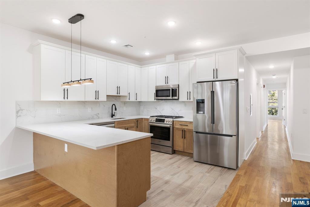 Photo 3 of Condo for sale at 1001 Summit Ave #2, Jersey City, NJ 07307 | MLS# 26035428 | Listing updated on 2026-09-17