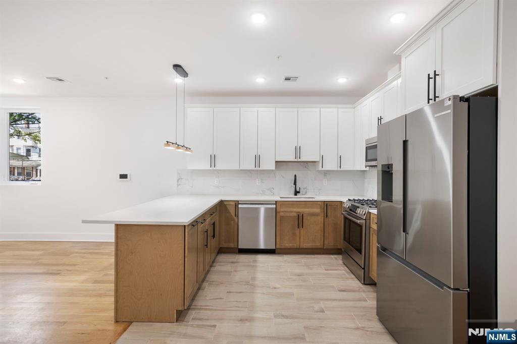 Photo 3 of Condo for sale at 1001 Summit Ave #2, Jersey City, NJ 07307 | MLS# 26035428 | Listing updated on 2026-09-17