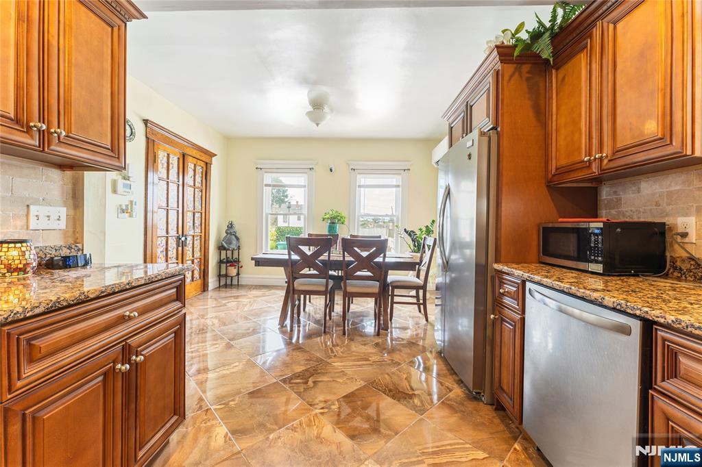 Photo 4 of Single family home for sale at 173-175 Lily St, Paterson, NJ 07522 | MLS# 26035616 | Listing updated on 2026-09-19