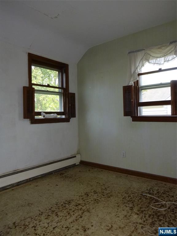Photo 2 of Single family home for sale at 13 White Oak Dr, Lodi, NJ 07644 | MLS# 26036894 | Listing updated on 2026-10-05