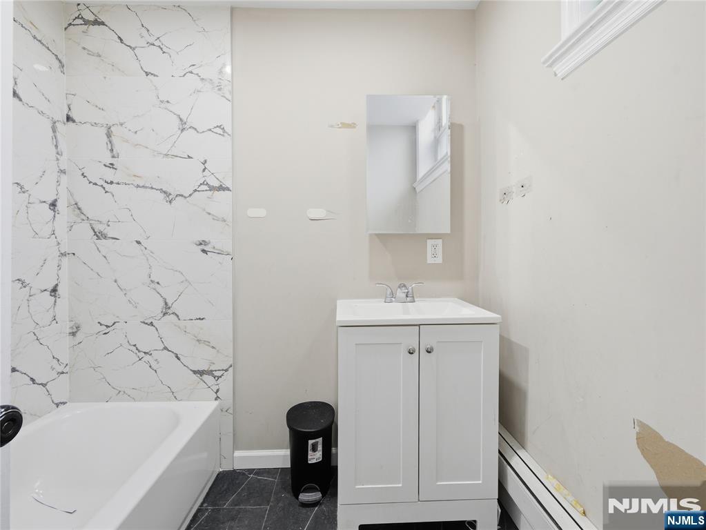 Photo 3 of Multi family home for sale at 302 Belmont Ave, Belleville, NJ 07109 | MLS# 26037066 | Listing updated on 2026-10-08