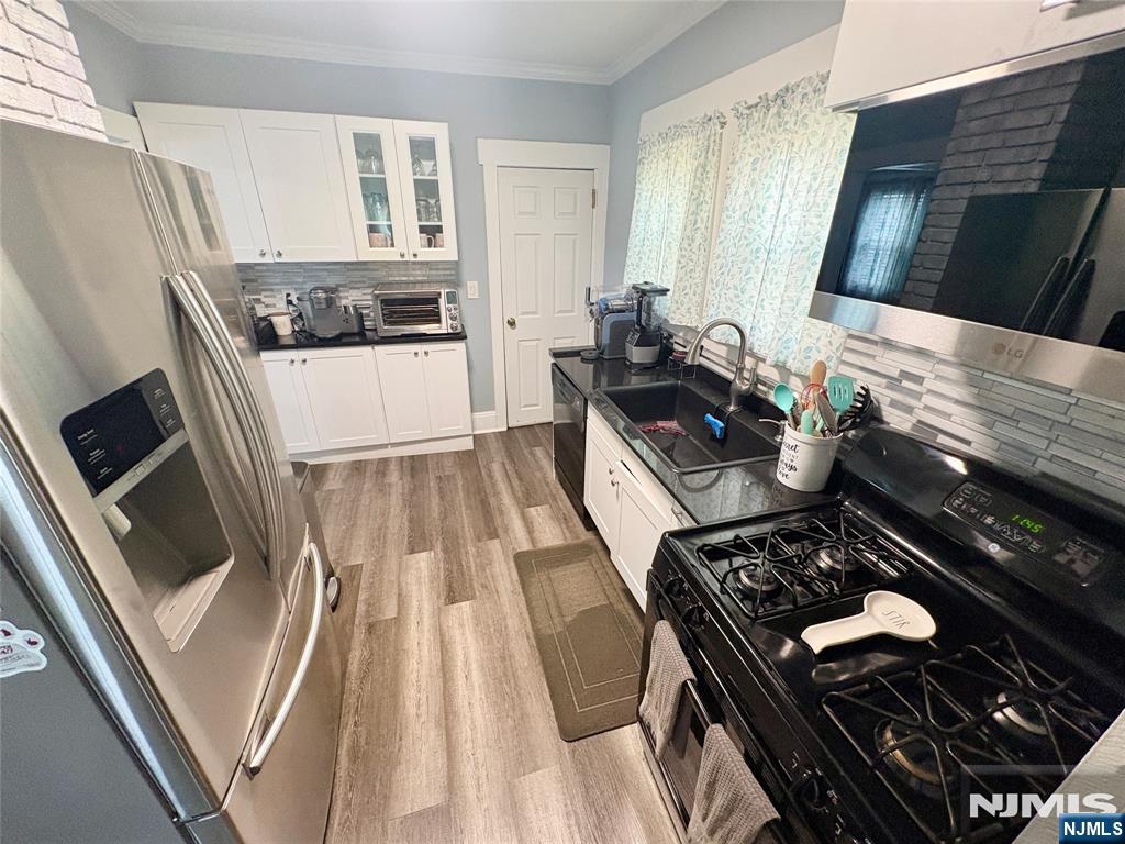 Photo 4 of Single family home for sale at 167 Warren St, Englewood, NJ 07631 | MLS# 26039229 | Listing updated on 2026-10-15